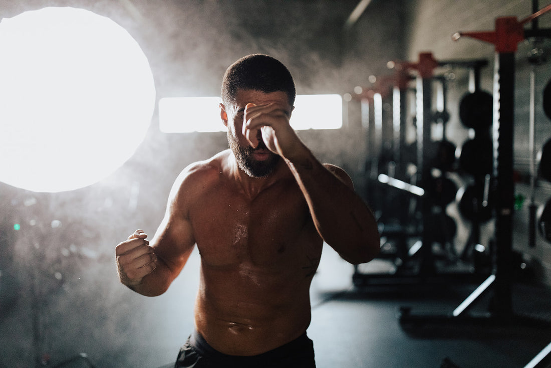 Trey shadow boxing in a gym